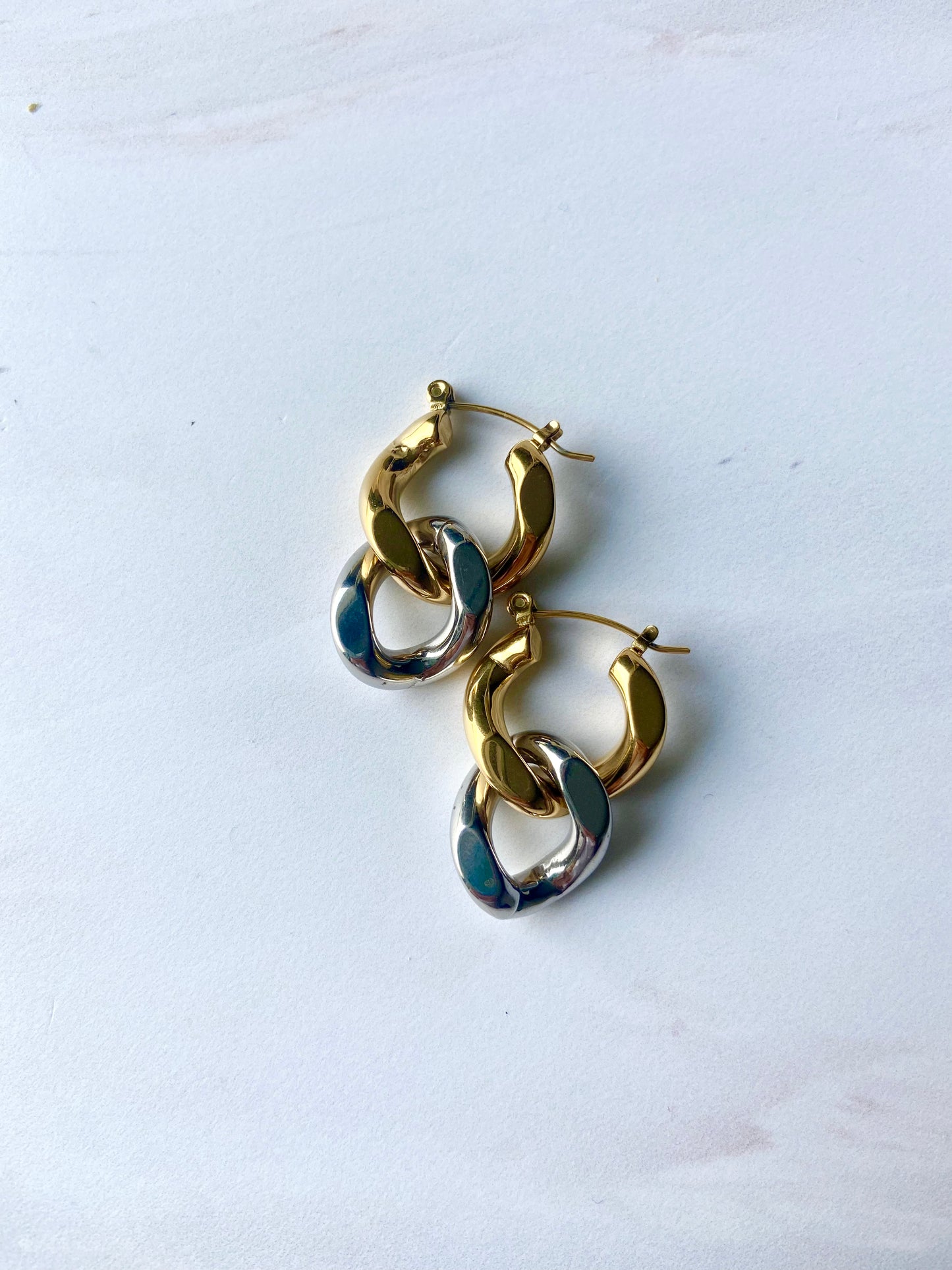 Silver and gold chained